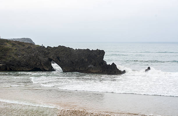 Rocks at coast of Atlantic Ocean. stock photo