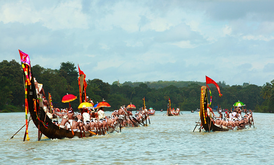 Aranmula ,Kerala ,India, – September 20, 2013 Oarsmen rowing in snake boats participating at Aranmula Boat race.