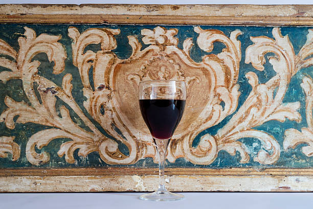 glass of red wine on a decorative background
