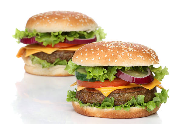 istock Two delicious hamburgers isolated on white background 500705693