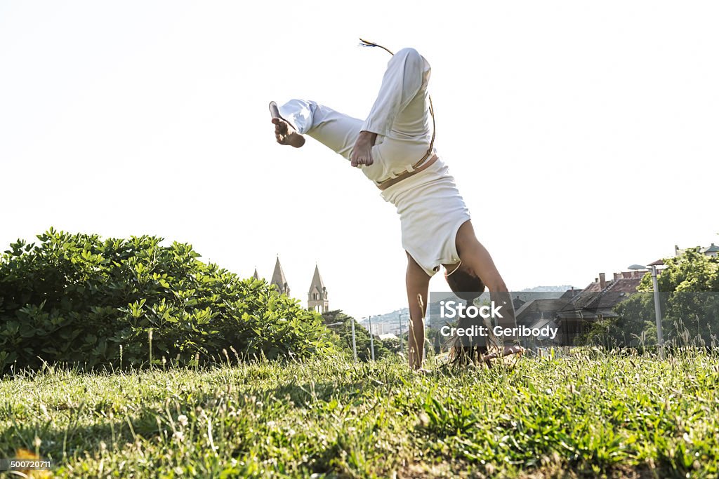 Capoeira woman, awesome stunts in the outdoors Capoeira Stock Photo