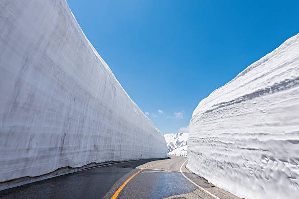 istock Road between Snow wall at Tateyama Kurobe Alpine Route, Japan 500720751