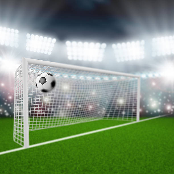istock soccer ball flies into the goal 500722491