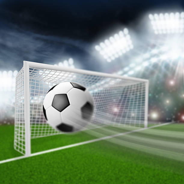 istock soccer ball flies into the goal 500722511