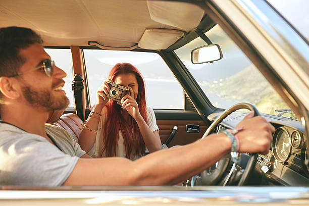 istock Young couple enjoying on a road trip 500722692