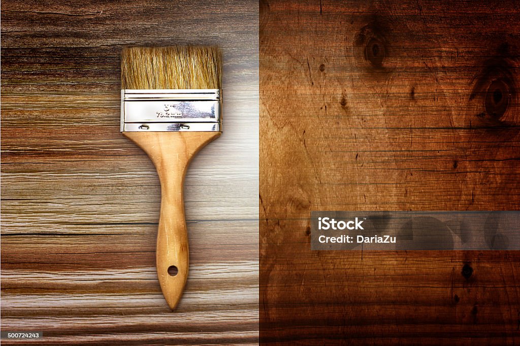 Renovation brush on wooden background Renovation brush on wooden background. Space for your text. Accuracy Stock Photo