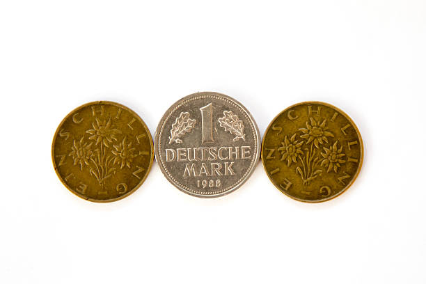 istock Obsolete Deutsche Mark and two Austrian schillings 500724250