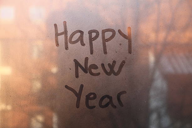 istock Happy New Year text written on the glass 500726154