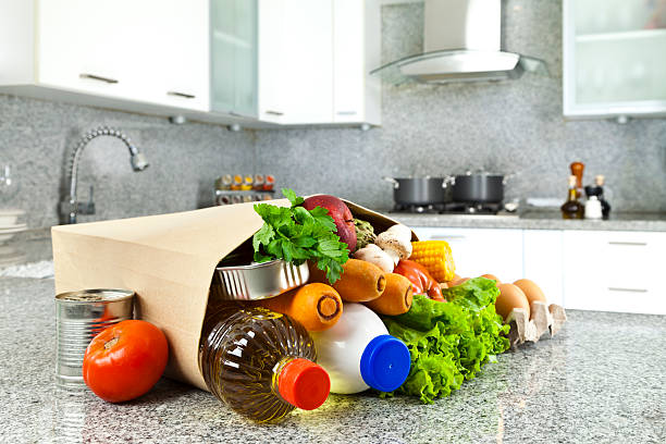 istock Shopping bag with groceries on kitchen countertop 500726598