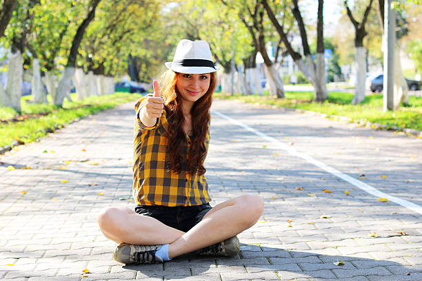 istock red-haired girl in a hat hipster 500727674