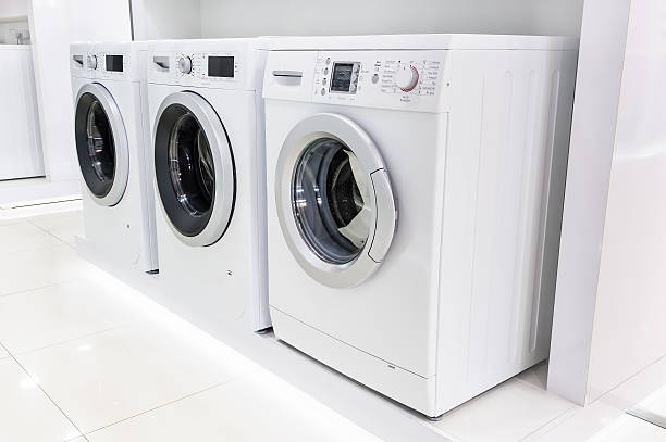 istock washing mashines in appliance store 500727740