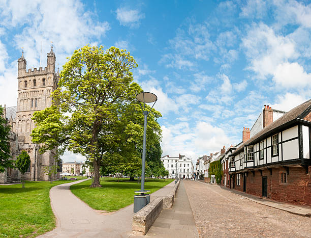 Tudor Buildings And Exeter Cathedral In England Old Tudor Buildings Around Exeter Cathedral In The UK exeter england stock pictures, royalty-free photos & images