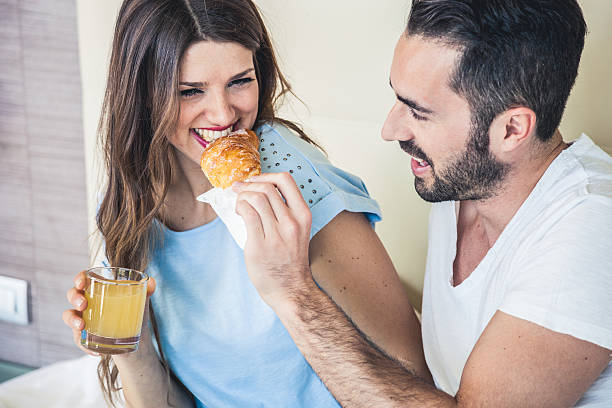 istock Couple in vacation having breakfast in hotel room 500728450