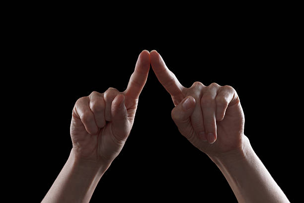 istock Gesture, young woman's hand indicates the direction or touch devices 500728898