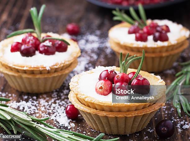 Tartlets Of Pastry With Cream And Fresh Berries Ripe Cranberries Stock Photo - Download Image Now