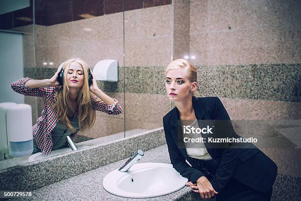 Beautiful Woman Businesswoman In Front Of A Mirror Stock Photo - Download Image Now - Mirror - Object, Reflection, Contemplation