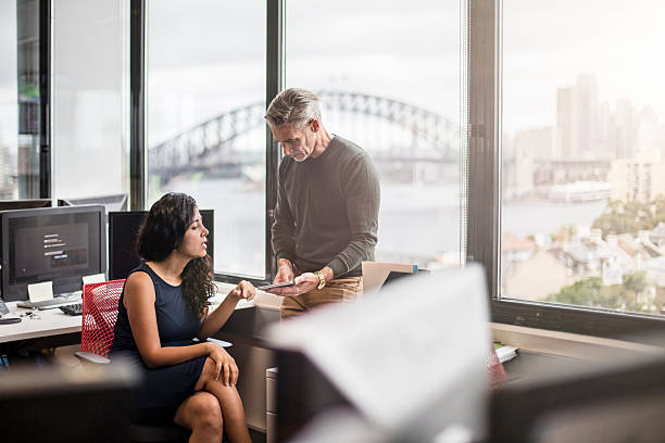 Business people in the office working with a digital tablet