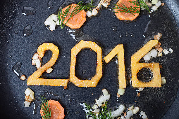 new year symbol fried on a pan stock photo