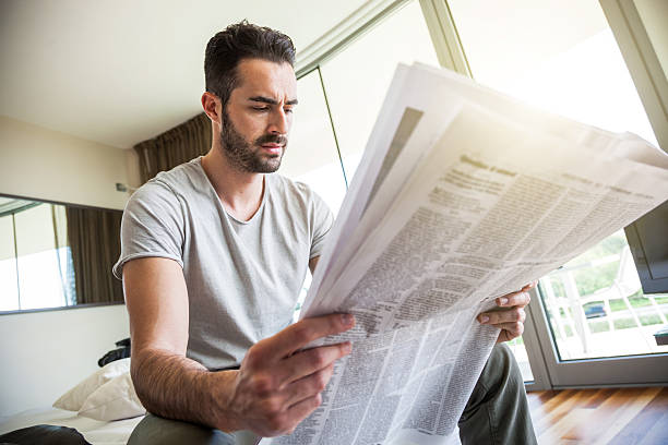 istock Man reading newspaper in the morning 500732686