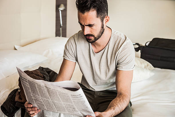 istock Man reading newspaper in the morning 500732978