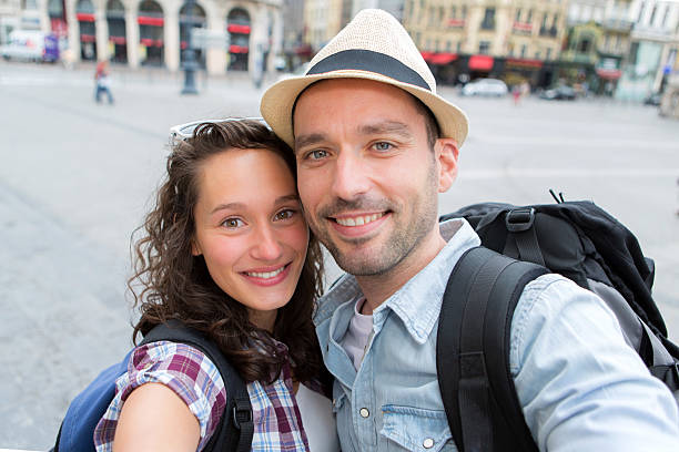 istock Young couple on holidays taking selfie 500733471