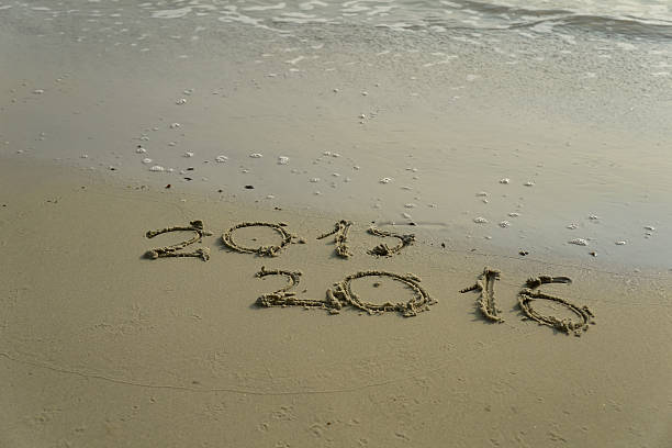 istock Year 2015 and 2016 on the sand beach 500734034