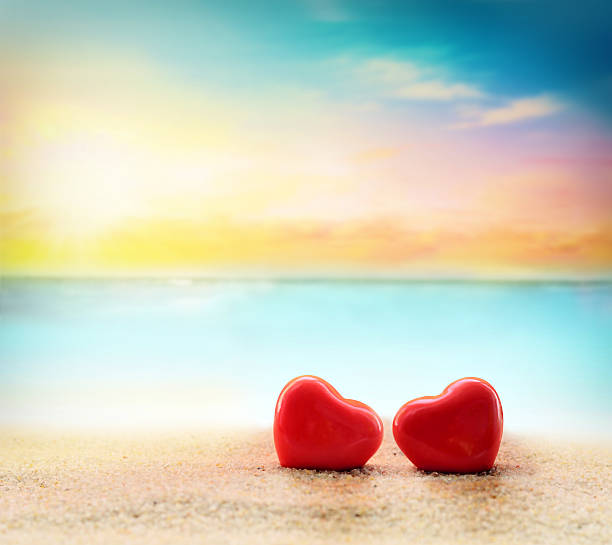 istock Two hearts on the summer beach 500734172