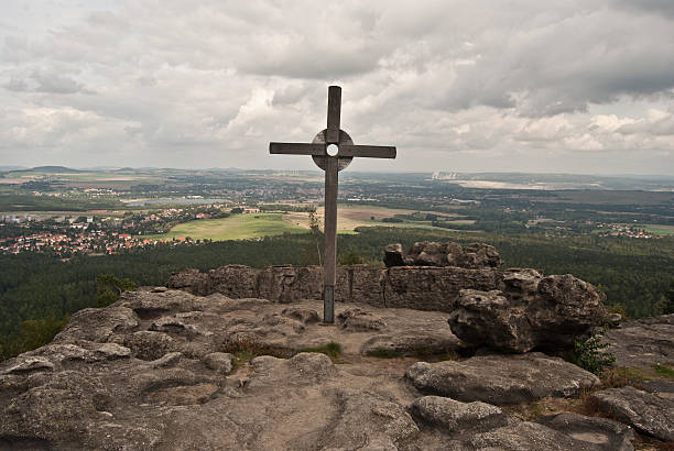 panorama from Topfer hill with croos in Zittauer Gebirge stock photo