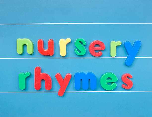 красочные буквы написание питомник rhymes на магните. - nursery rhyme стоковые фото и изображения