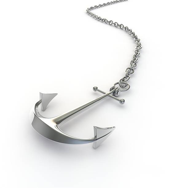 istock Ship anchor silver on a chain lying on the floor 500736348