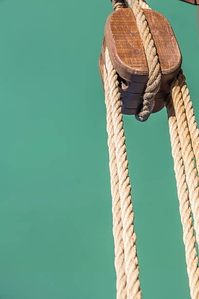 istock Ropes under tension and Pulley 500738286