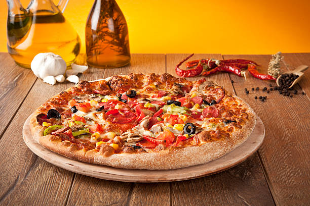 Delicious supreme Italian pizza stock photo