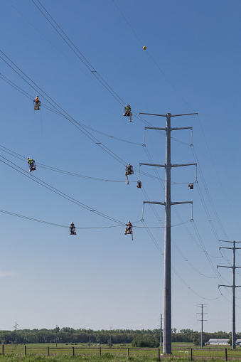 Line Workers Riding Wire High Wire Line Workers Stock Photo - Download Image Now - Cable ...