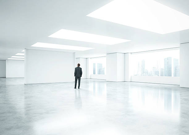 istock Young businessman standing in bright office 500741155