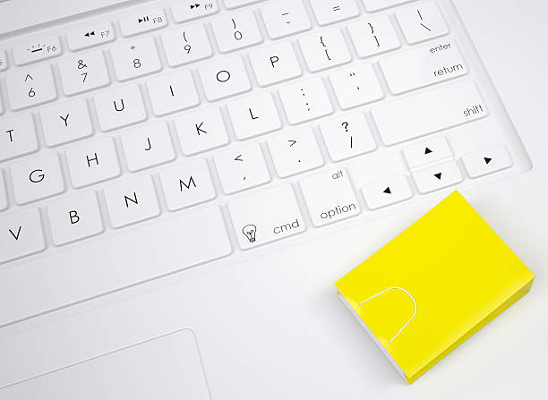 istock Shopping paper bag on the keyboard 500741185