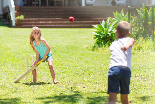 istock Australian kids playing cricket 500748148
