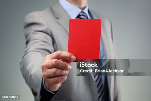 istock Businessman showing the red card 500751647