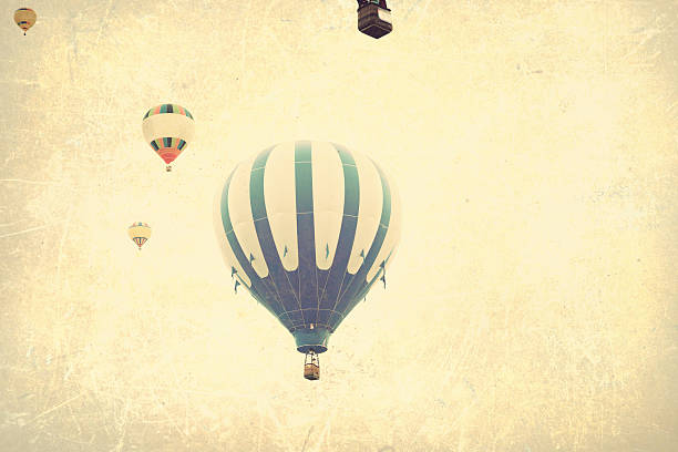 Vintage colorful hot air balloons in flight