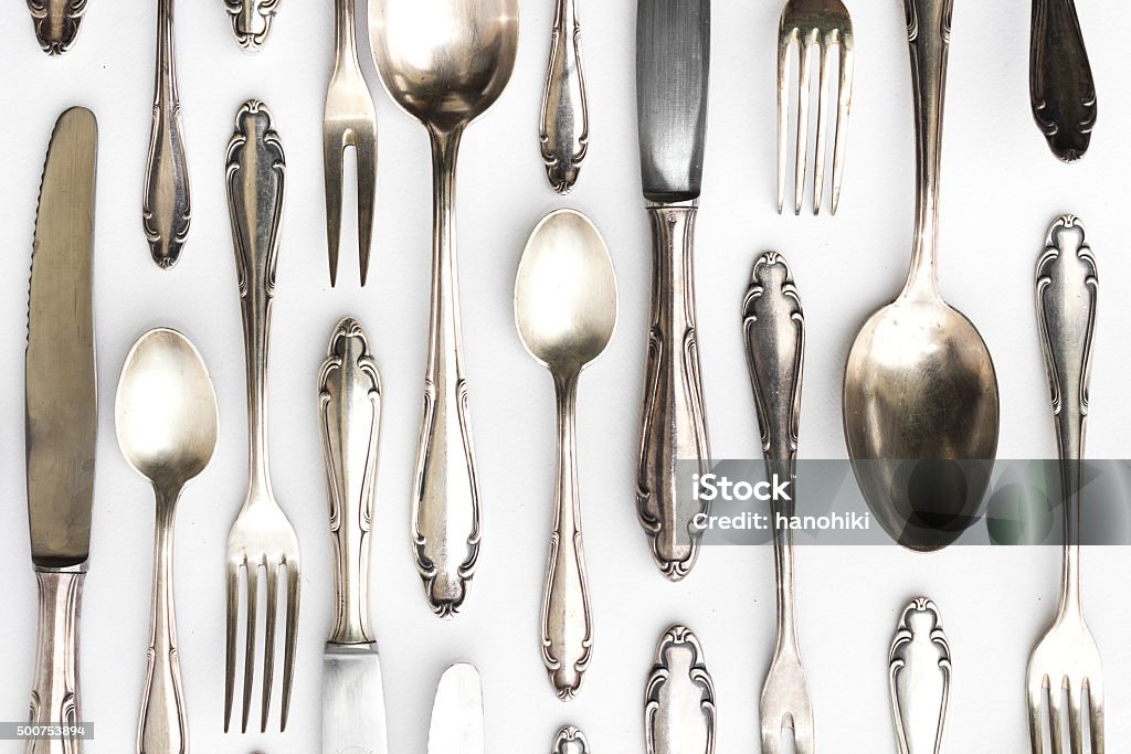 beautiful sterling cutlery set on white background beautiful sterling cutlery collection on white background Silverware Stock Photo