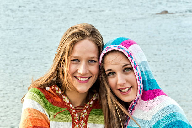 istock Two beautiful teens enjoy outdoor 500754370