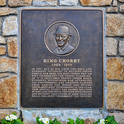 Pebble Beach, CA, USA - Dec. 5, 2015: Bing Crosby Plaque honors Bing Crosby - singer, actor, avid golf player - for helping the youth. Out of this concern was born the Bing Crosby Pro-Am Golf Tournament, popularly known as the \