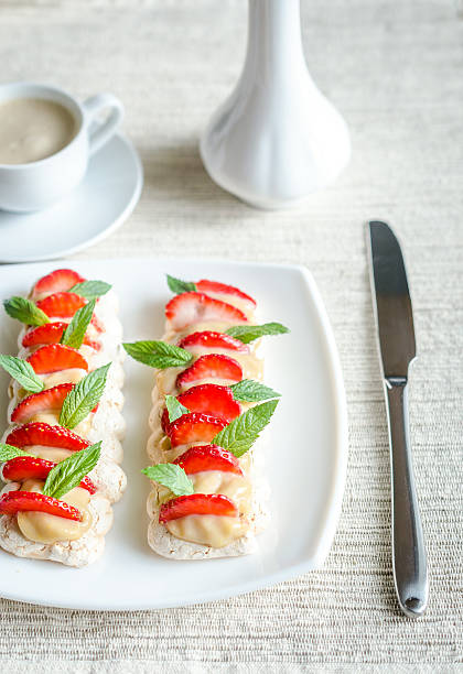 istock Meringue cake with cream and fresh strawberries 500755667