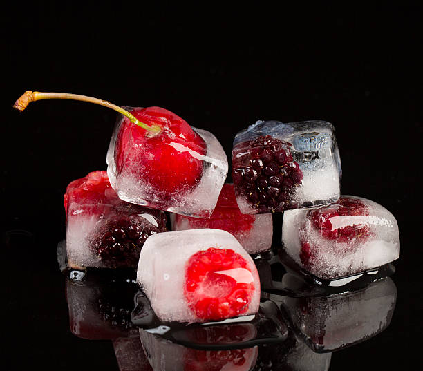 istock Fresh fruits frozen in ice cubes 500757241