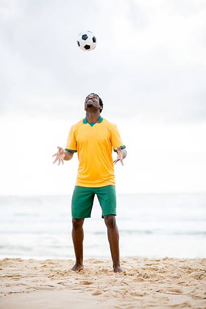 istock Man playing football 500757615
