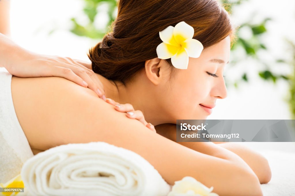 Beautiful young woman enjoy spa salon Spa Treatment Stock Photo