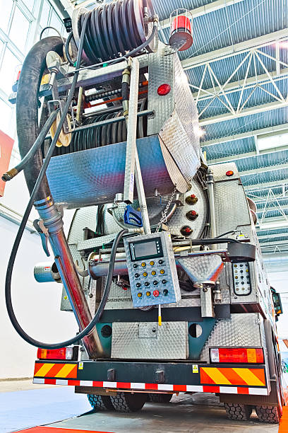 istock sewer flusher and suction truck 500759286
