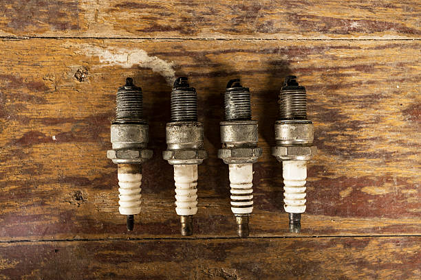 Spark plug on 4 stroke motorcycle engine .spark plug in the cylinder of motorcycle. motorcycle engine parts