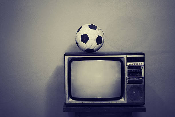 istock Old soccer ball on a retro TV, black and white 500763781