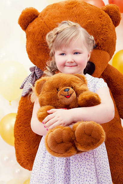 istock Charming little girl hugging favorite toy 500766595