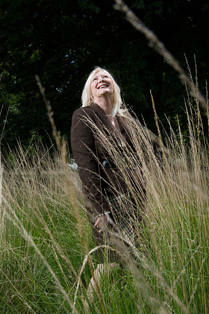 istock Woman Standing In Field 500767087